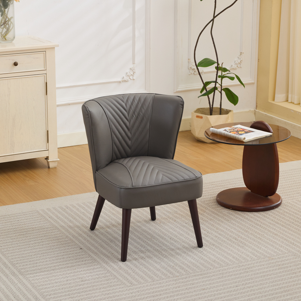 Sillón individual cuero gris sin brazos con patas de madera