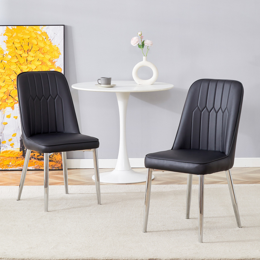 Silla de comedor pu negra plateada con respaldo ergonómico