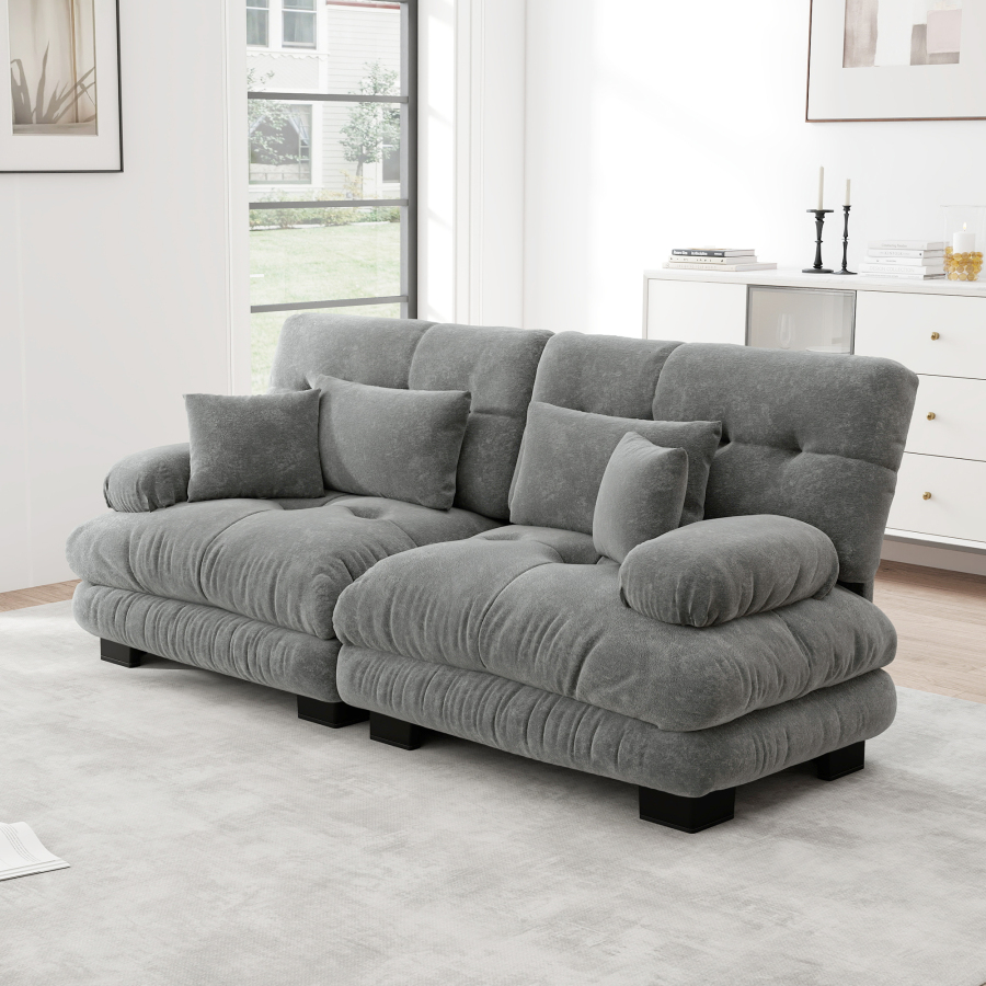 Sofá modular de chenilla gris para salón con cojines y diseño nube