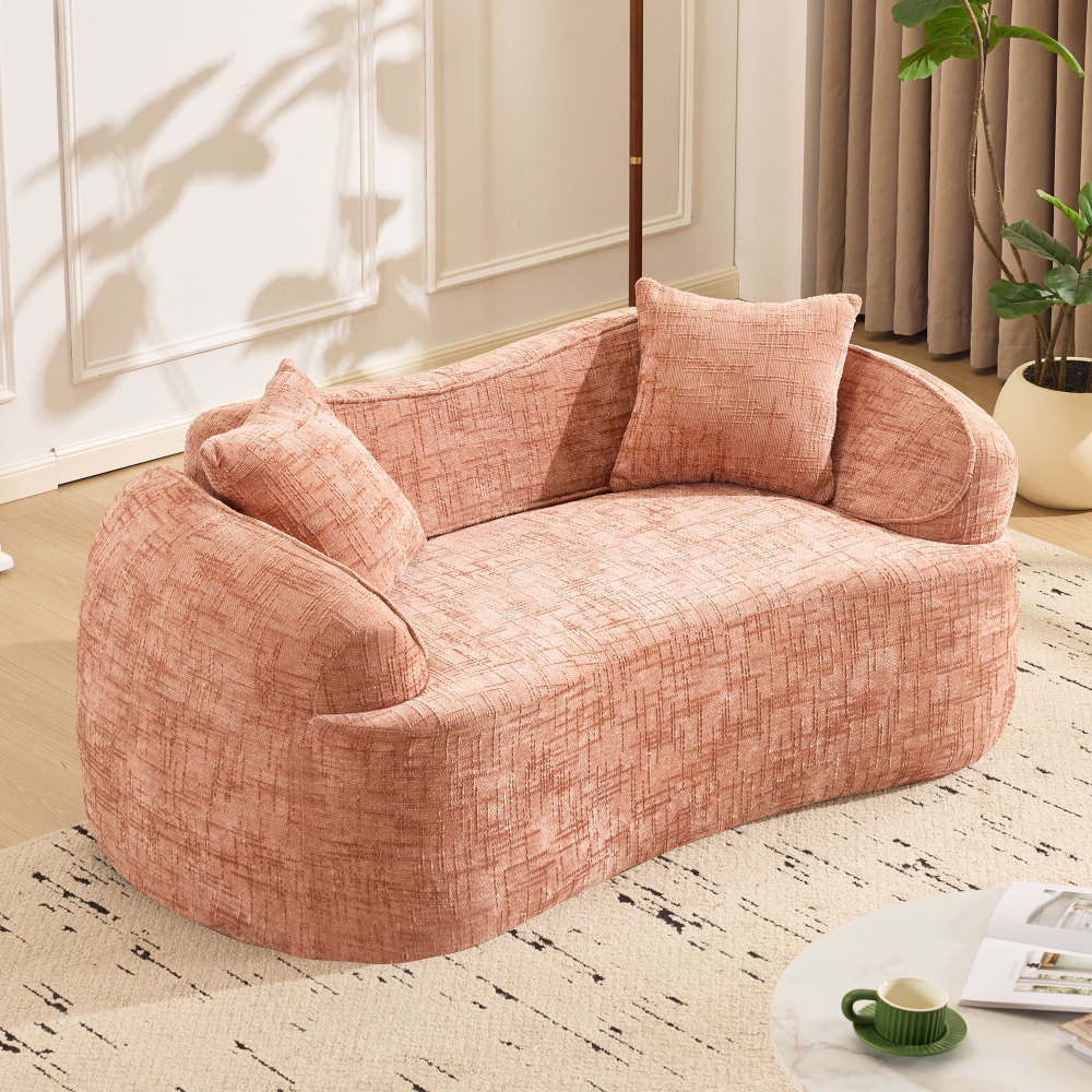 Sofá curvo 2 plazas rosa reposabrazos 2 cojines