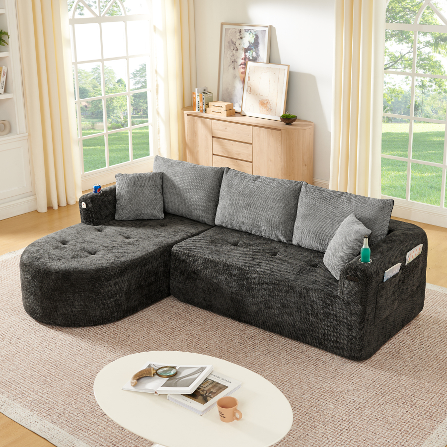 Sofá en l modular de tela negro con portavasos y bolsillos laterales