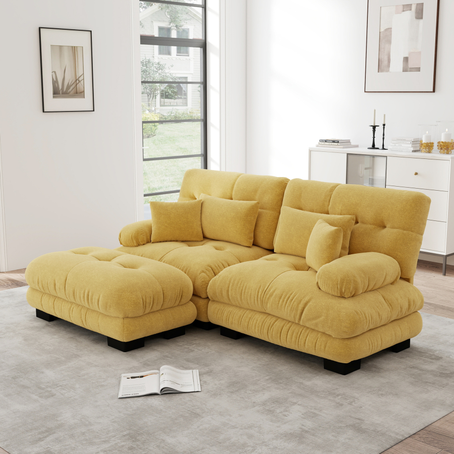 Sofá modular de chenilla amarillo con otomanas móviles y cojines para salón