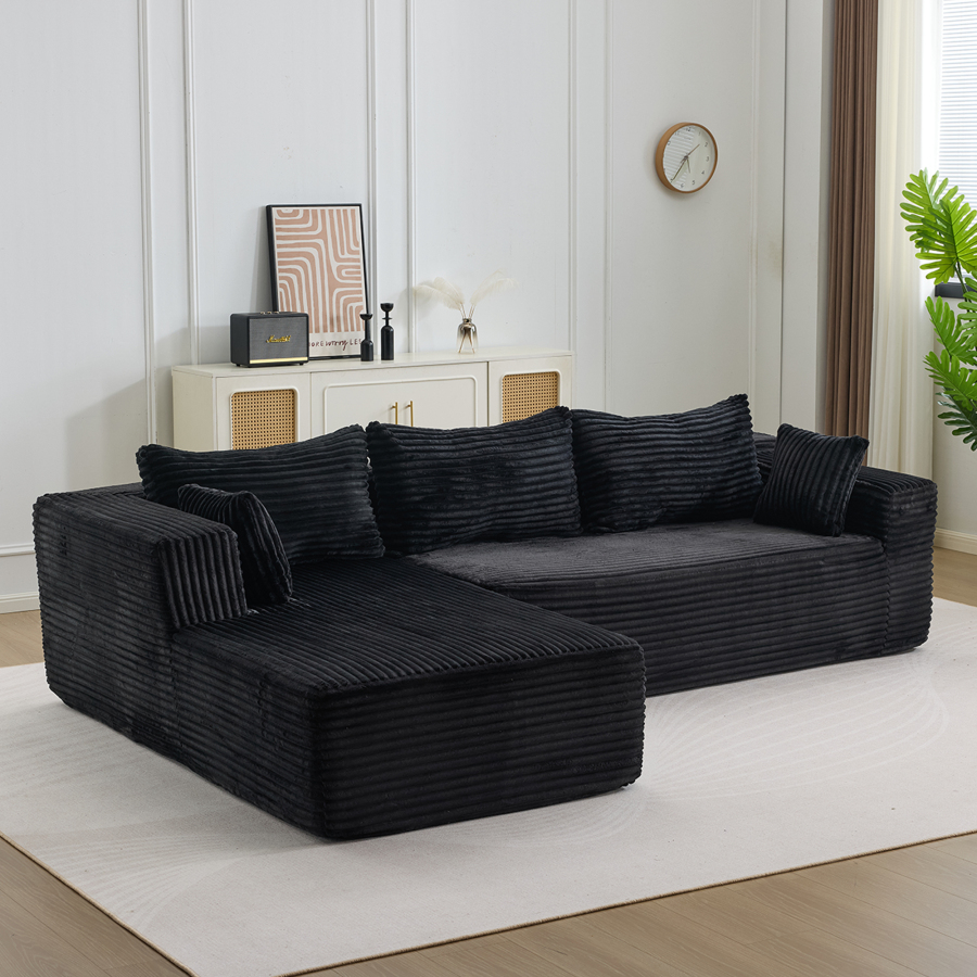 Sofá en l modular de pana negro con chaise longue asiento profundo