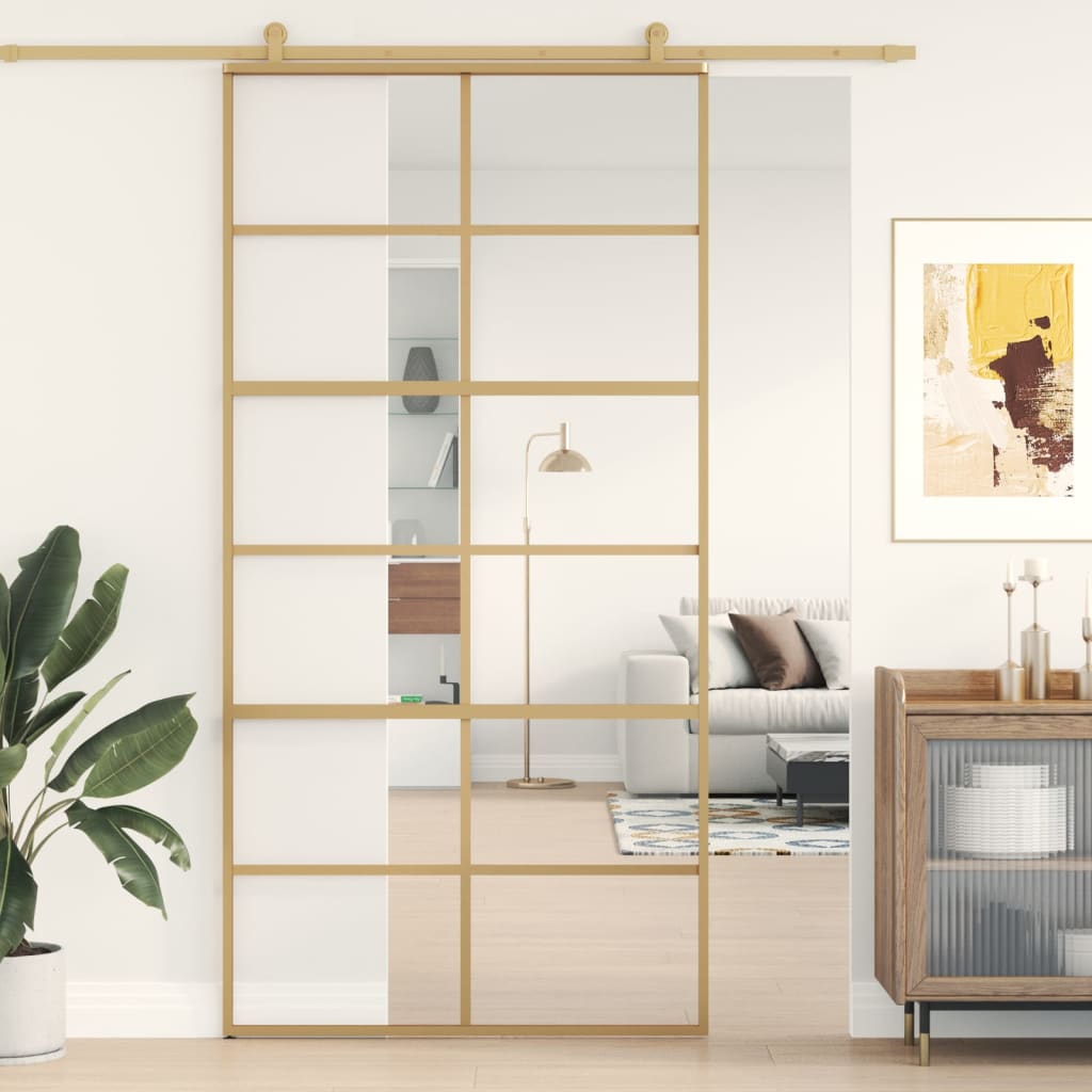Puerta corredera dorada de vidrio esg transparente y aluminio esxt3252