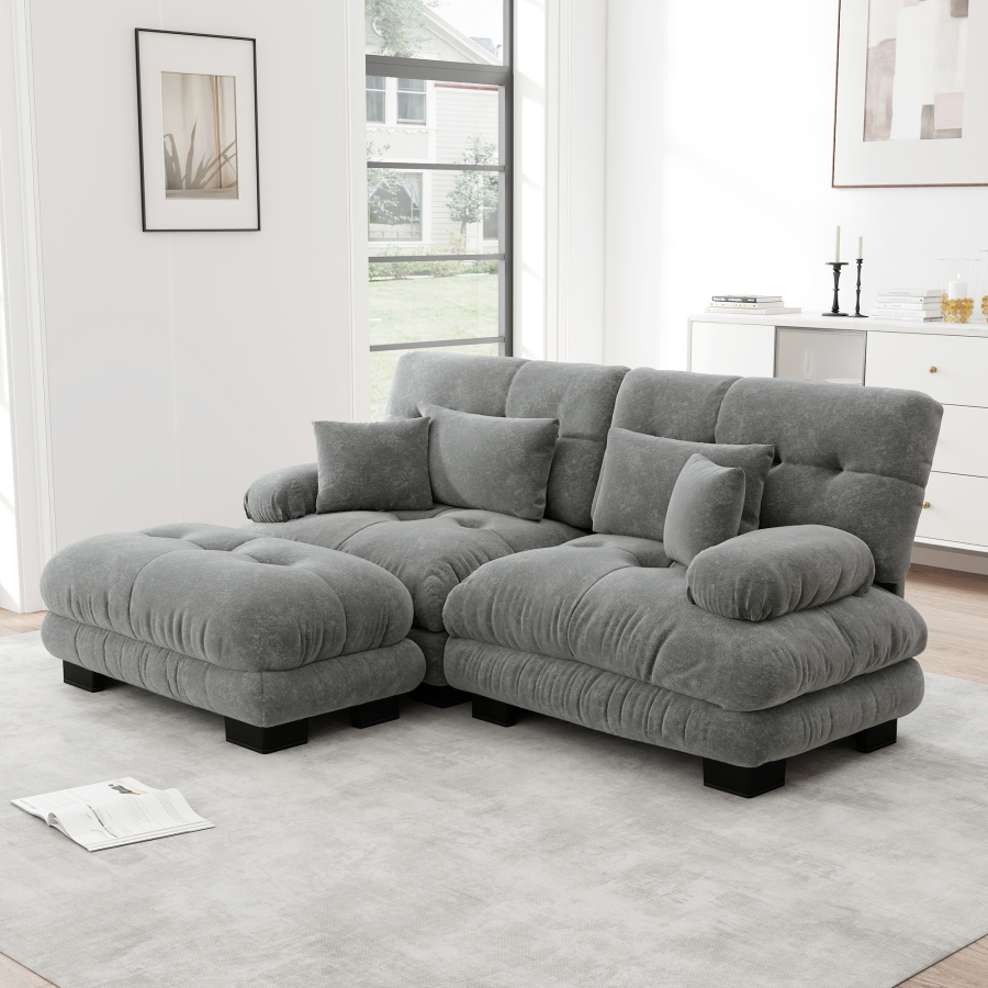 Sofá modular de chenilla gris con otomana móvil y cojines para salón