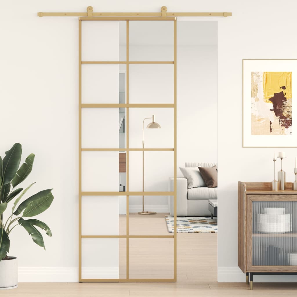 Puerta corredera dorada de vidrio esg transparente y aluminio esxt7899
