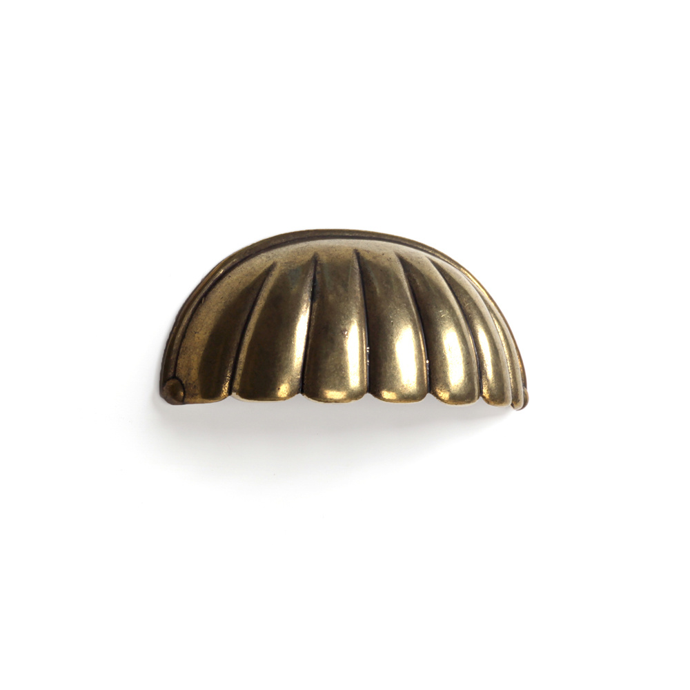 Tirador concha oro viejo 64 mm