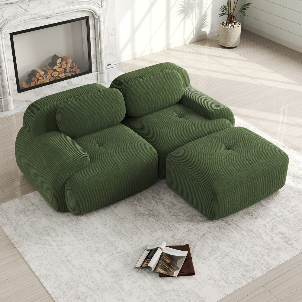 Sofá modular en l pana verde sin estructura reposabrazos curvos