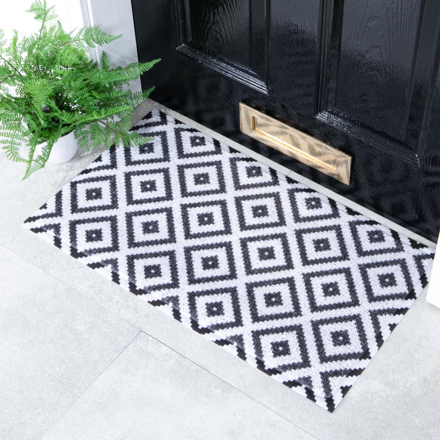 Felpudo para exterior con diseño de rombos en blanco y negro (70 x 40 cm)