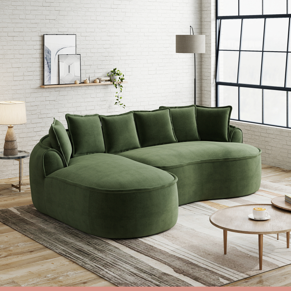 Sofá modular en l de chenilla verde con chaise longue y cojines