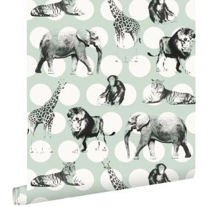Papel pintado animales sobre grandes puntos lunares menta verde y negro