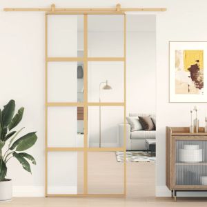 Puerta corredera dorada de vidrio esg transparente y aluminio esxt6085