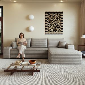 Sofá modular en l de tela camel con chaise longue y asiento profundo