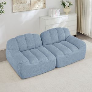 Sofá modular 2 plazas de forro polar granulado azul con otomana sin montaje