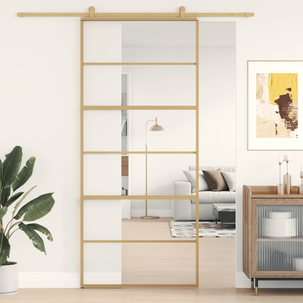 Puerta corredera dorada de vidrio esg transparente y aluminio esxt3646