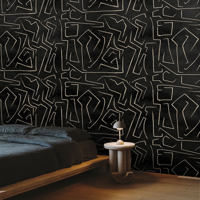 Papel pintado graffiti negro y dorado con rayas abstractas