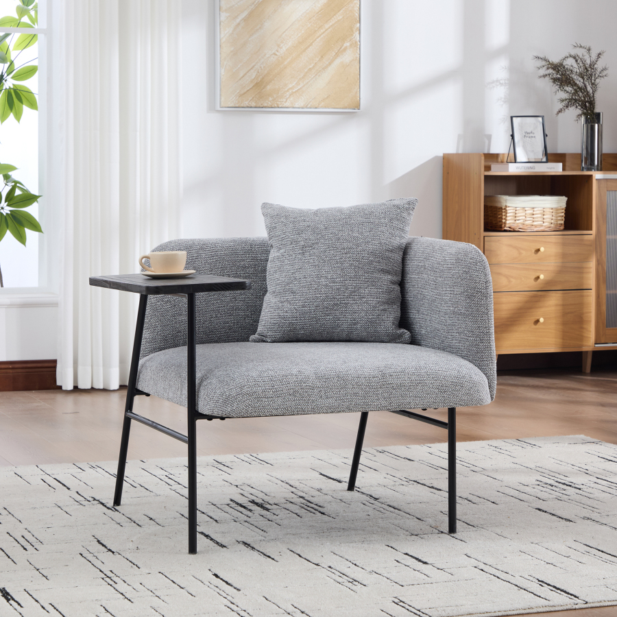 Sillón individual chenilla gris mesa auxiliar bolsillos laterales salón