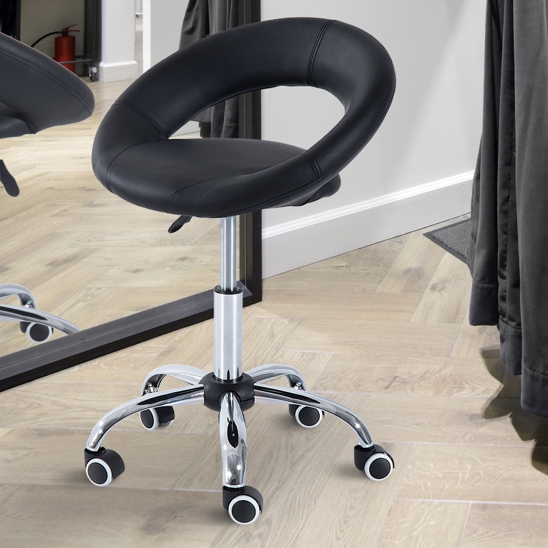 Silla giratoria ergonómica negra con respaldo piel sintética