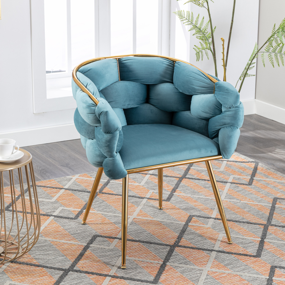 Sillón terciopelo azul con patas metálicas doradas